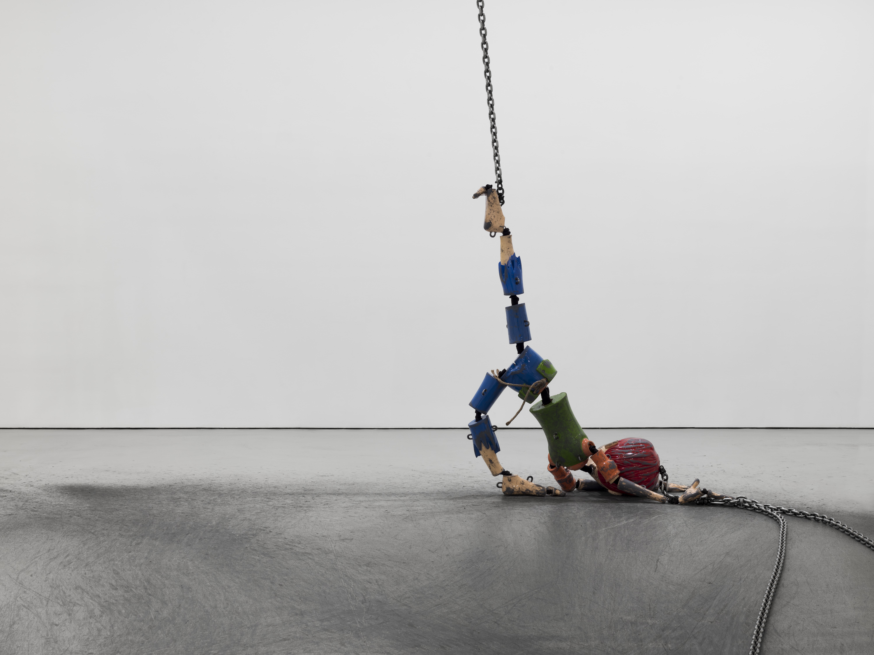 This Human-Sized Marionette in Chains Is Just Uncomfortable
