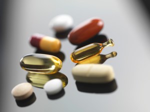pills and capsules on a flat surface