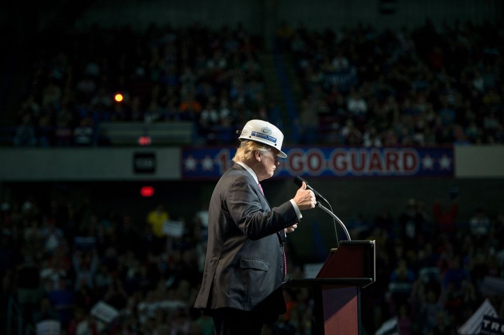 Trump wearing a hard hat at a rally in West Virginia