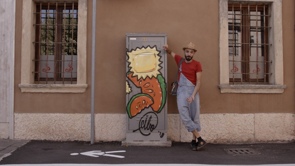 This street artist replaces swastika graffiti in Italy with paintings of pasta and cheese