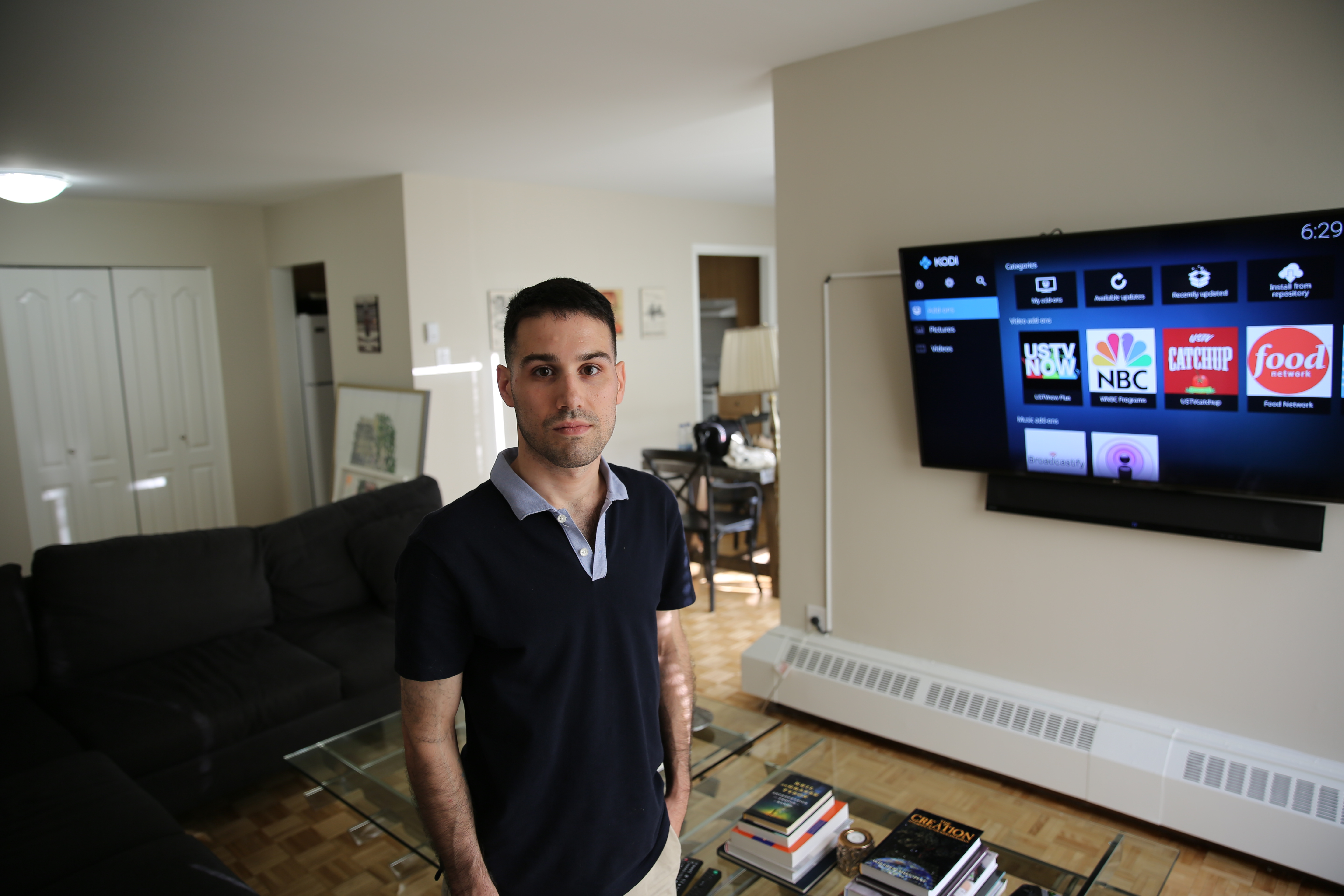 Adam Lackman demonstrating the Kodi user interface.