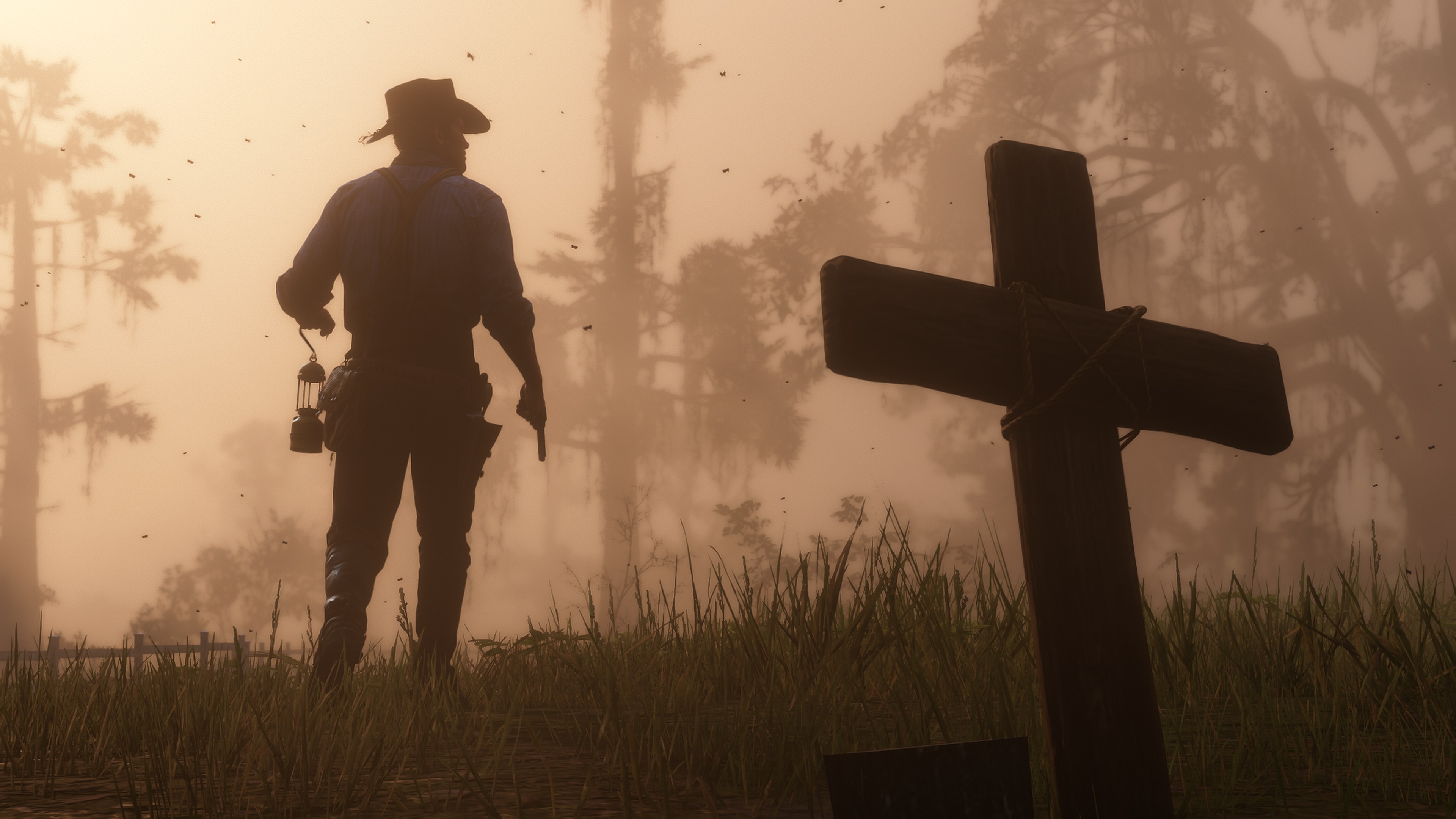 A plain and crude wooden cross rises from the short grass of a forest clearing marking yet another grave that is being left in the wake of this cowboy who stands, a lanter in one hand and a six-shooter in the other, about to move on through the gathering twilight that has cast the scene in an eerie sepia glow.