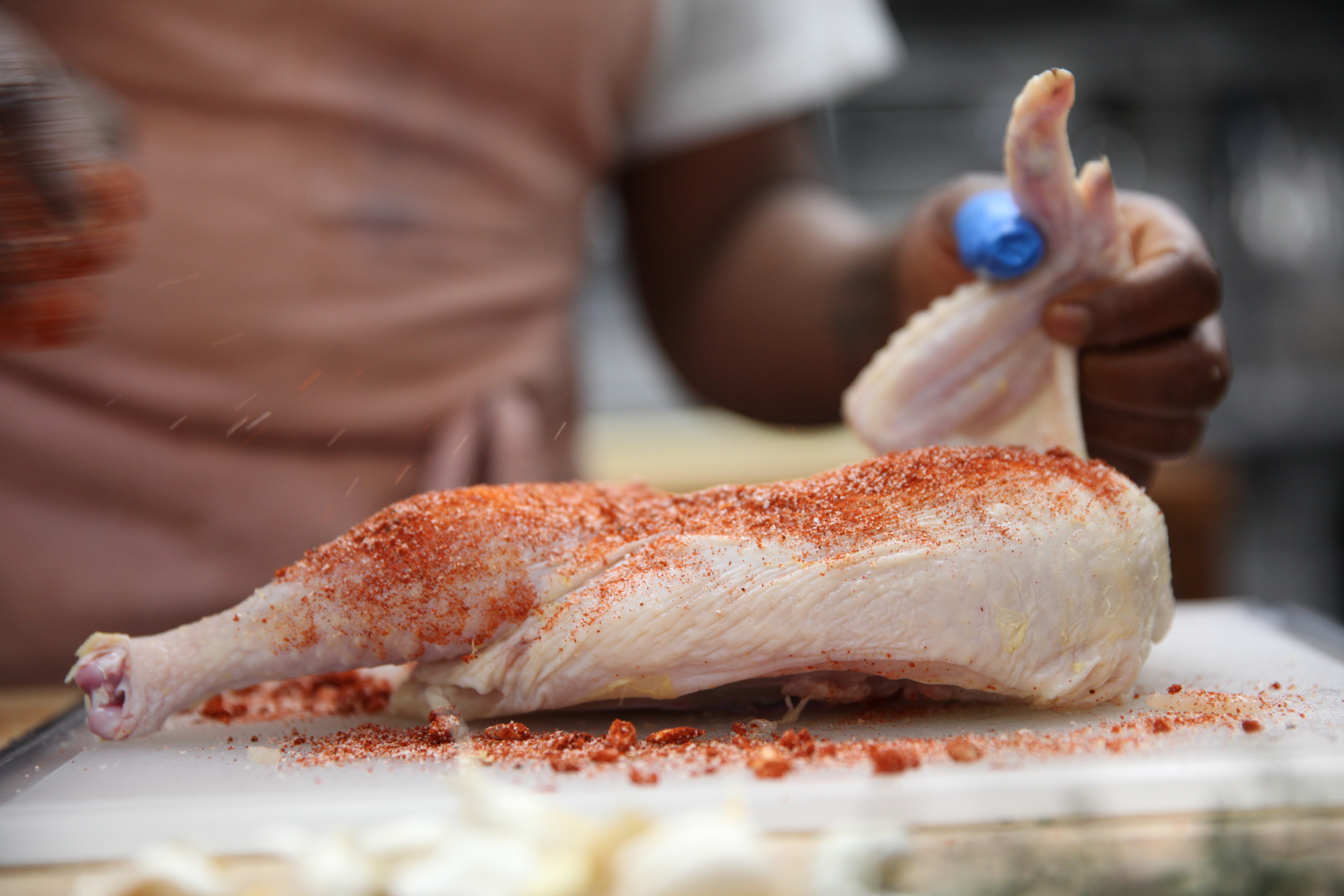 raw chicken with spice rub