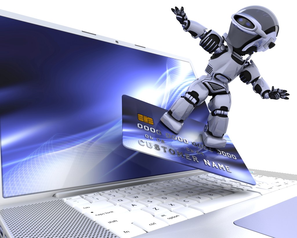 A robot surfs on a credit card.