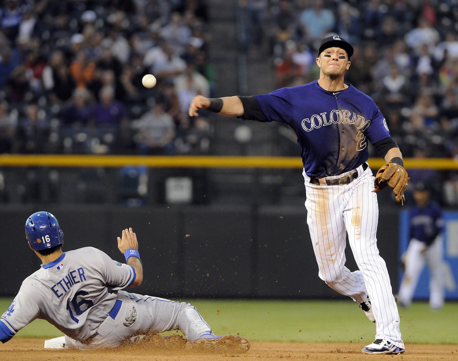 Troy Tulowitzki showing off his arm on the Colorado Rockies. Photo by Rick Giase/EPA