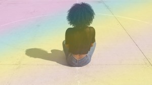 Teenager sitting alone