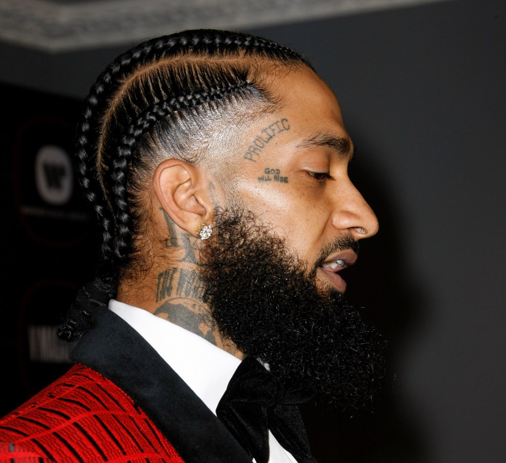Police have arrested the man suspected of murdering Grammy-nominated rapper Nipsey Hussle, the Los Angeles Police Department said Tuesday.