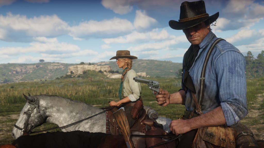 Arthur Morgan and a companion ride across an open plain together.