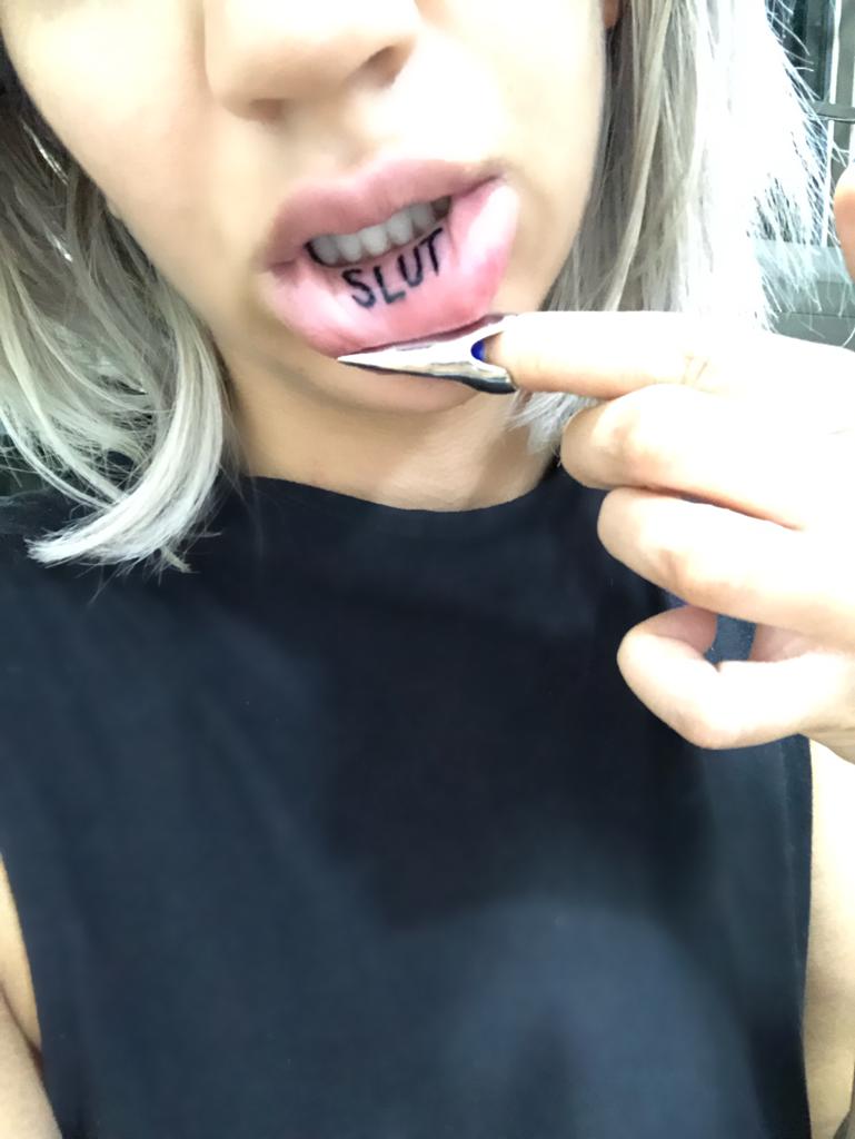 1563259557995-Slut-tattoo-1