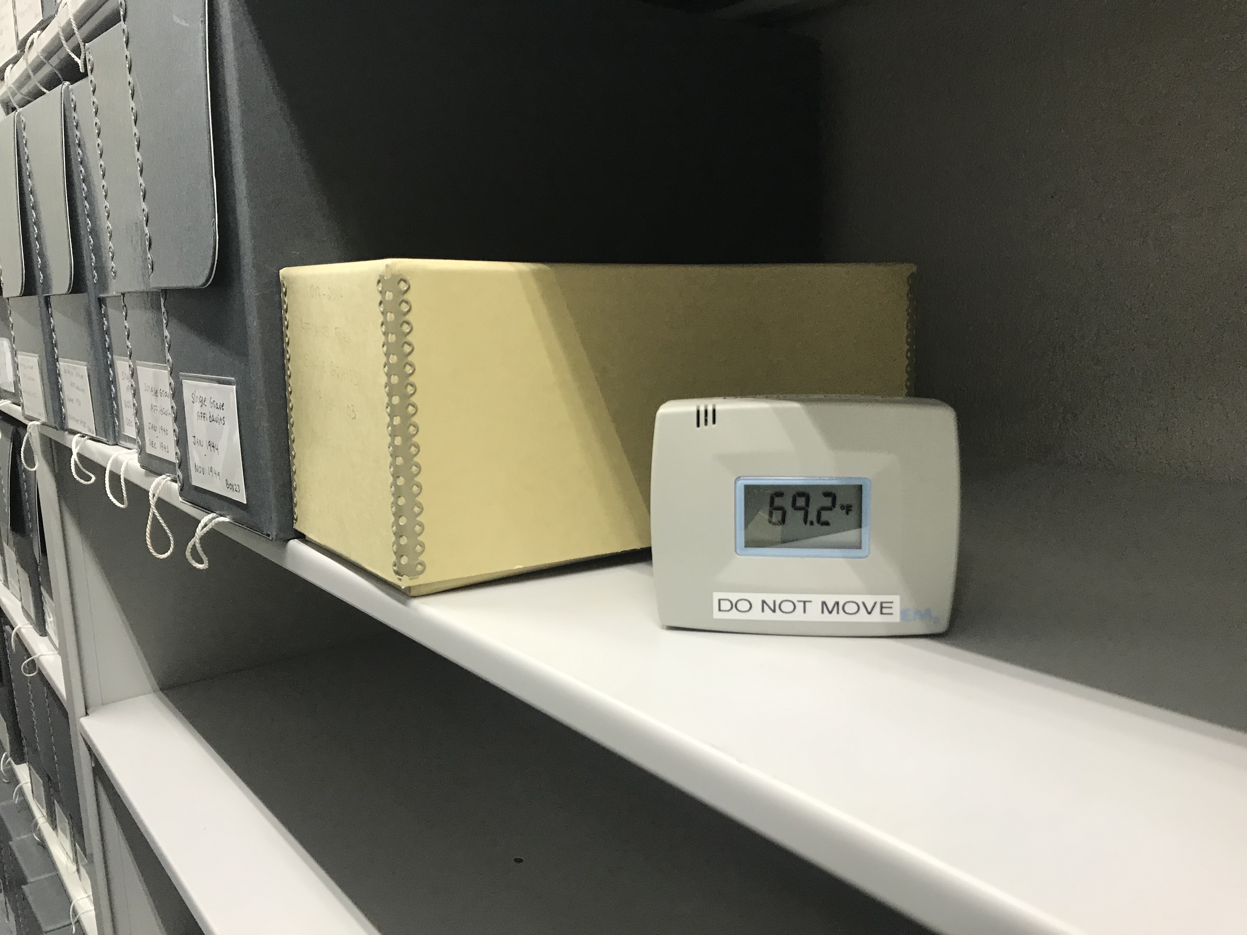 Climate monitoring device at the Green-Wood Cemetery archives.