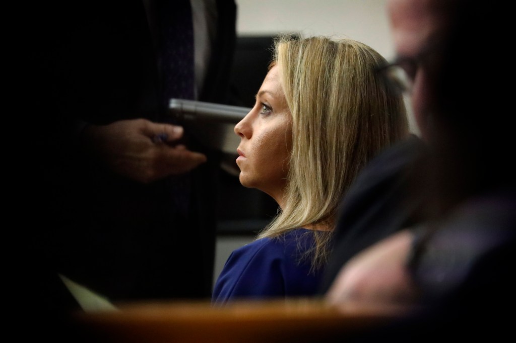 Fired Dallas Police Officer Amber Guyger listens as her attorneys make arguments during her murder trial, Monday, Sept. 23, 2019, in Dallas. Guyger went on trial in the shooting death of a black neighbor as attorneys sparred over whether the office