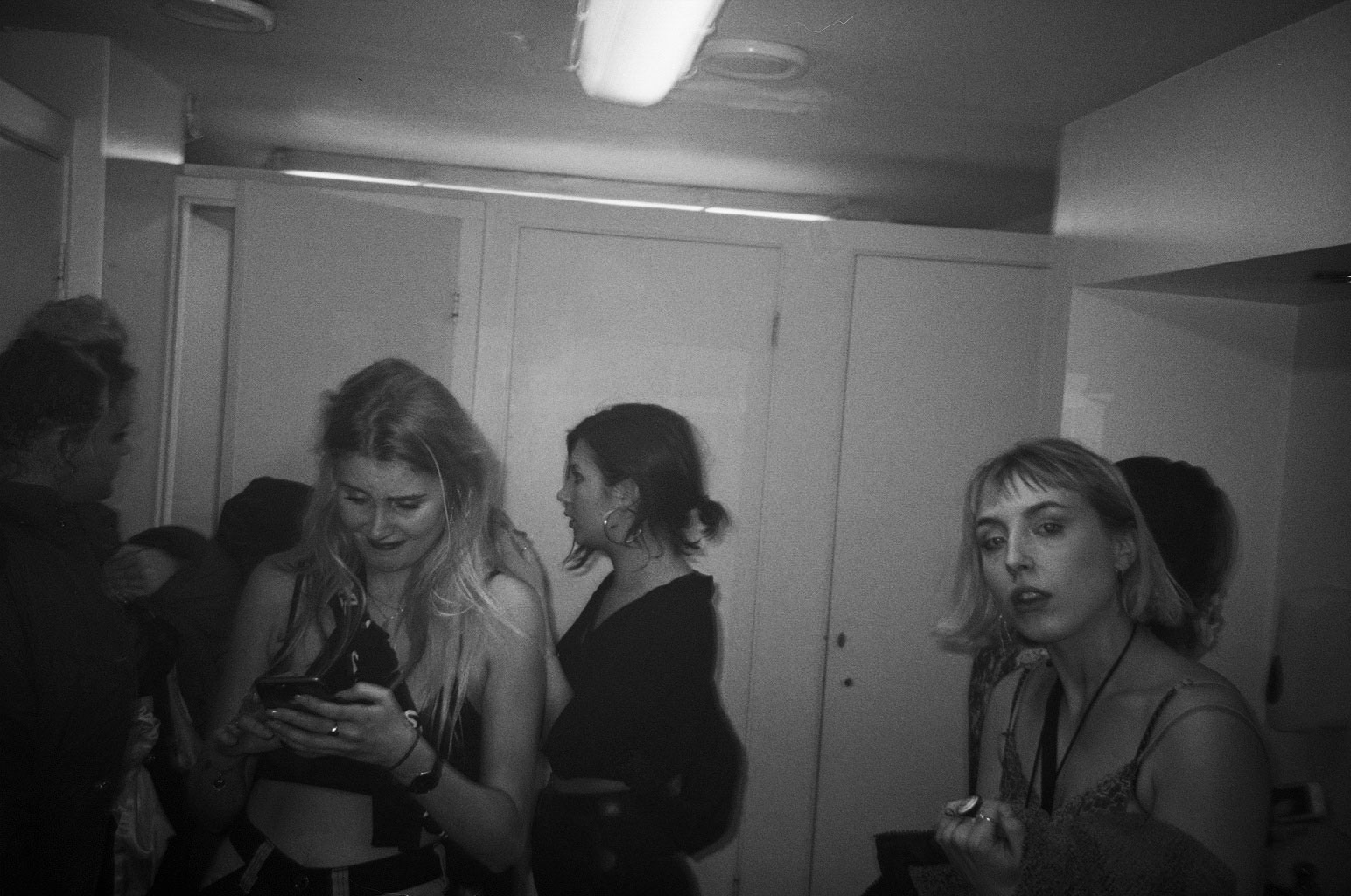 Girls in bathroom by Emily Bowler