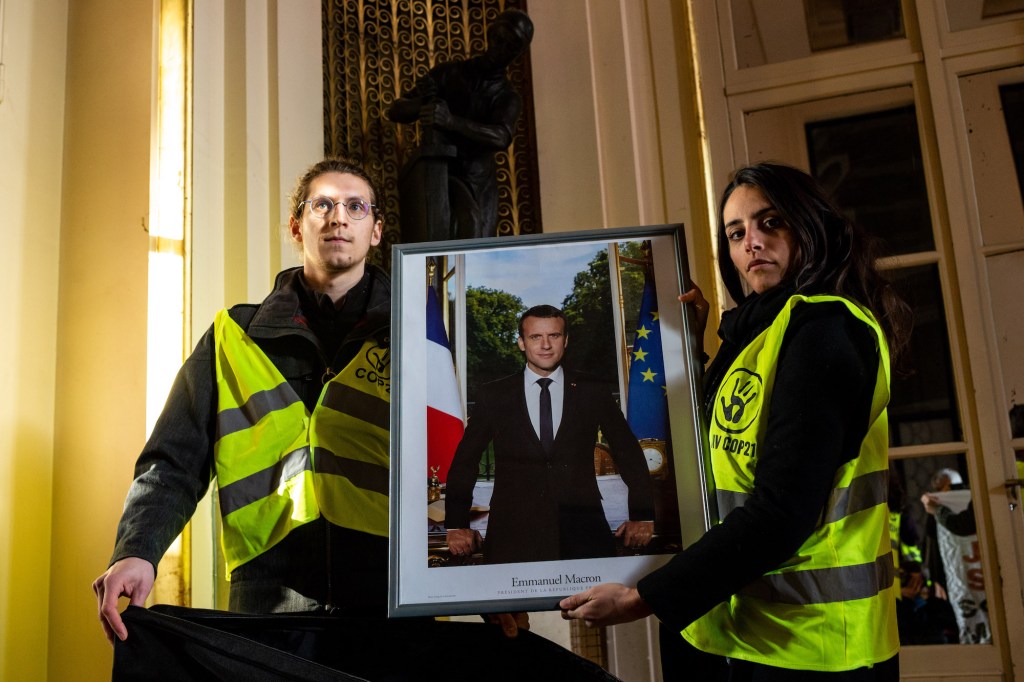 Climate Protester Faces Prison for Stealing Portraits of France’s President