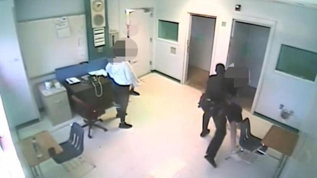 Image from surveillance video allegedly shows Broward County Sheriff's Deputy Ward Miller throwing a 15-year-old student to the ground.