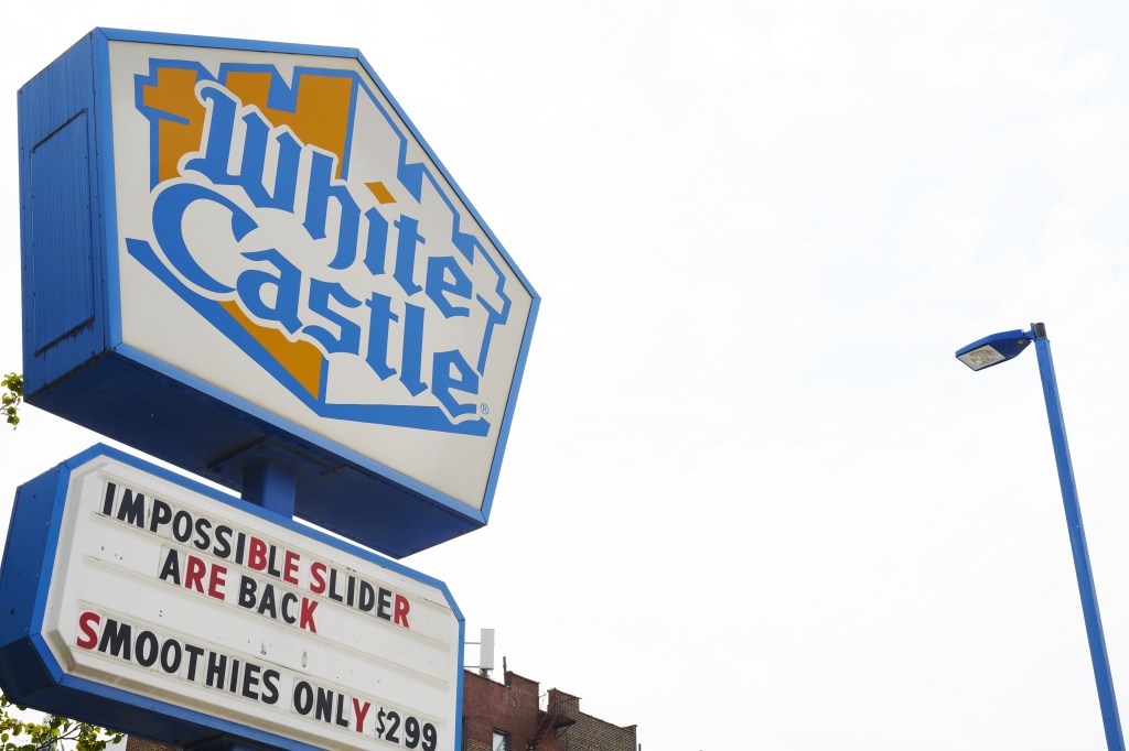 White Castle signage informs customers that the Impossible Foods Inc. Slider is back in stock outside a restaurant on Wednesday, July 31, 2019.