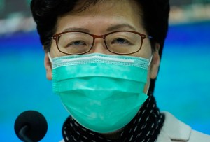 Hong Kong Chief Executive Carrie Lam wears a protective face mask speaks during a press conference