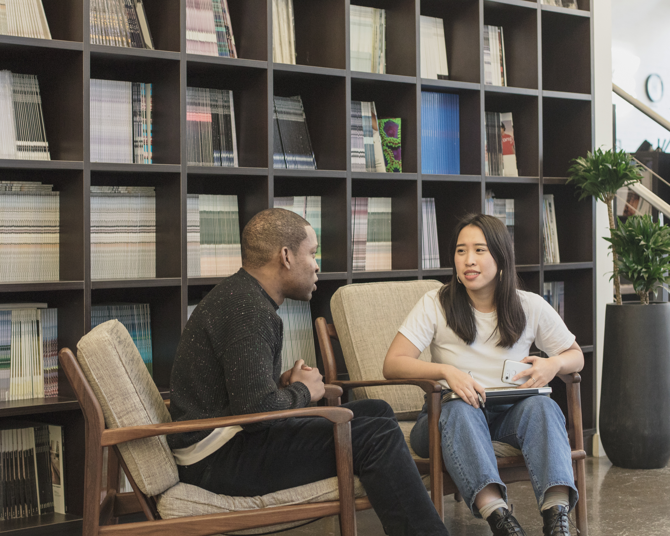 Woman talking to man in VICE UK office