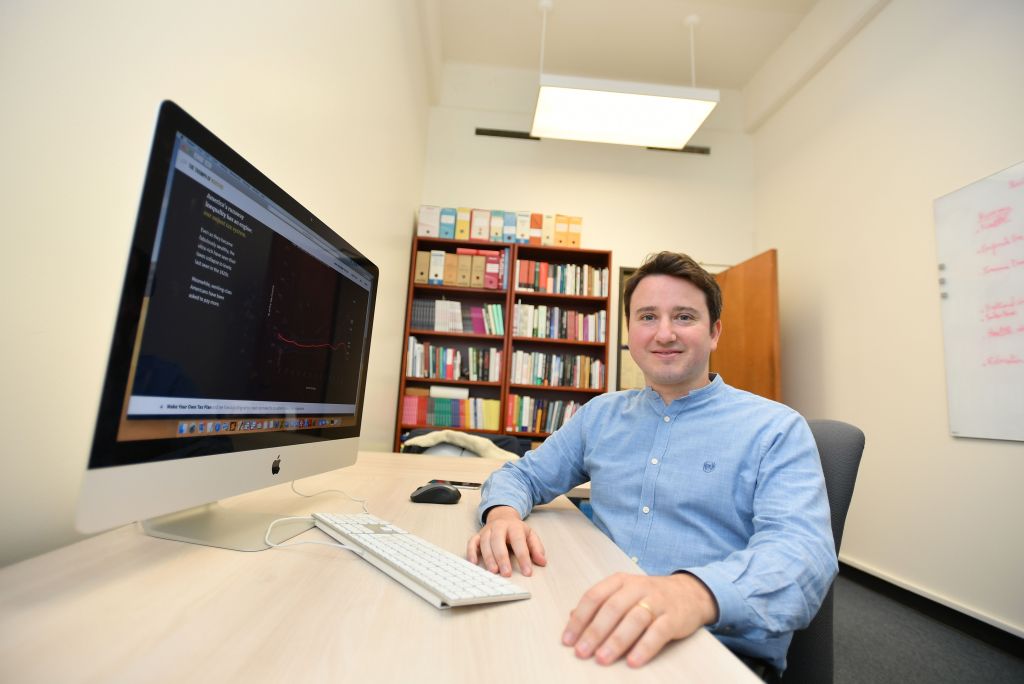 Gabriel Zucman at desk