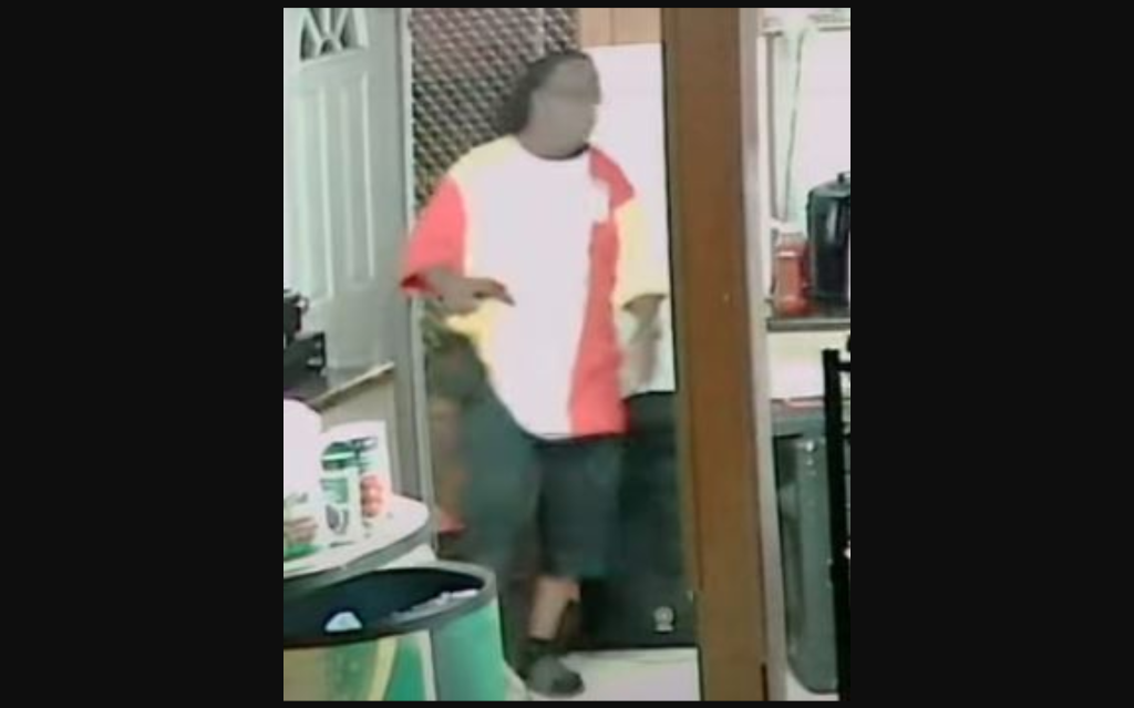 Screenshot via security footage released by the Louisville Police Department Tuesday.