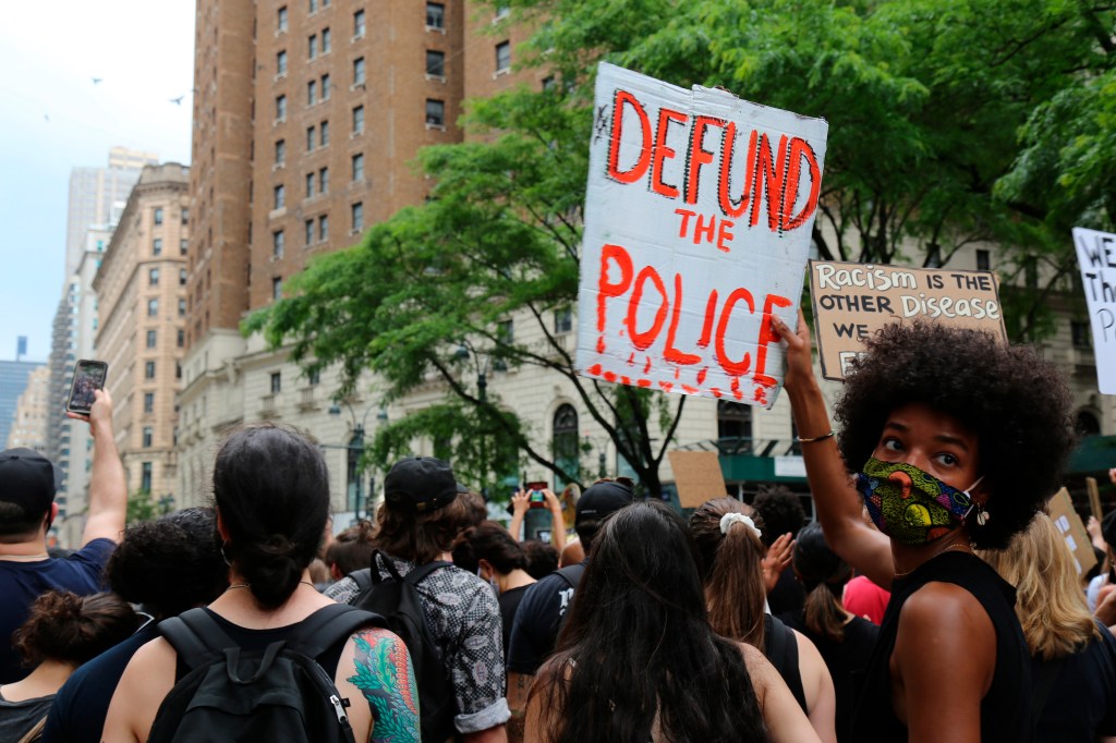 In this June 6, 2020, file photo, protesters march in New York. Since Floyd’s killing, police departments have banned chokeholds, Confederate monuments have fallen and officers have been arrested and charged. The moves come amid a massive, nationwide ou