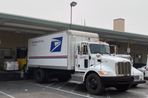 A United States Postal Service truck at the East Los Angeles office, Saturday, Sept 12, 2020, in Los Angeles. (Kirby Lee via AP)