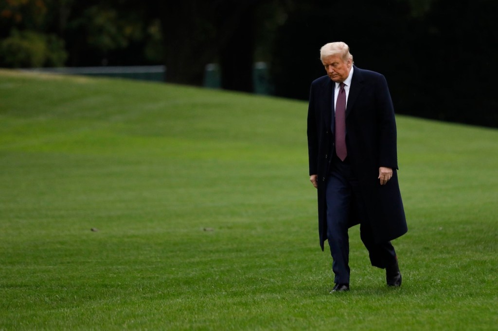 U.S. President Donald Trump walks on the South Lawn of the White House after arriving on Marine One in Washington, D.C., U.S., Thursday, Oct. 1, 2020.
