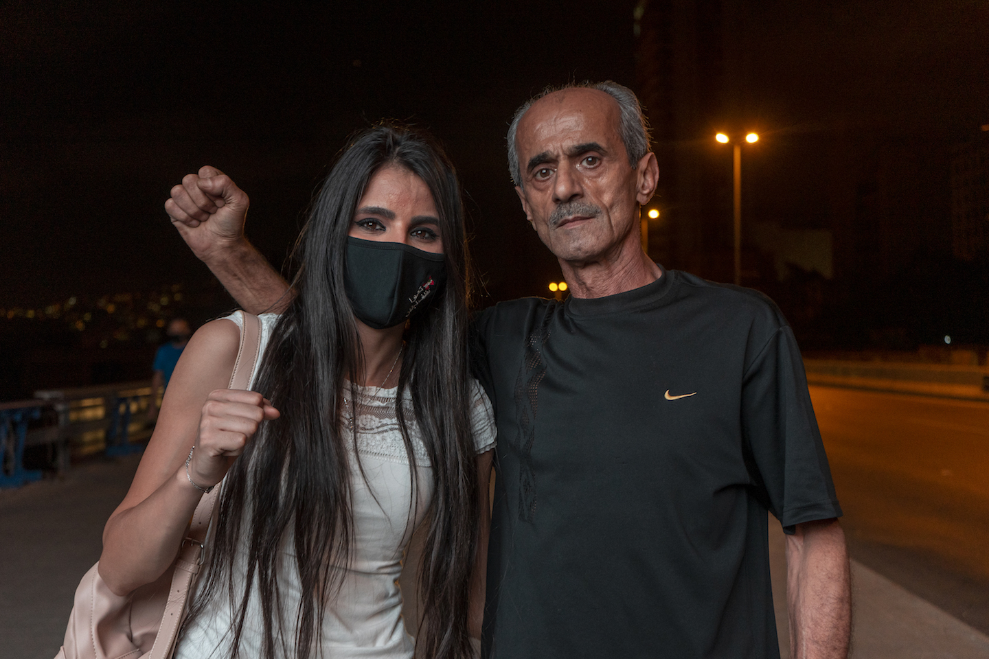 Farah with her dad at protest