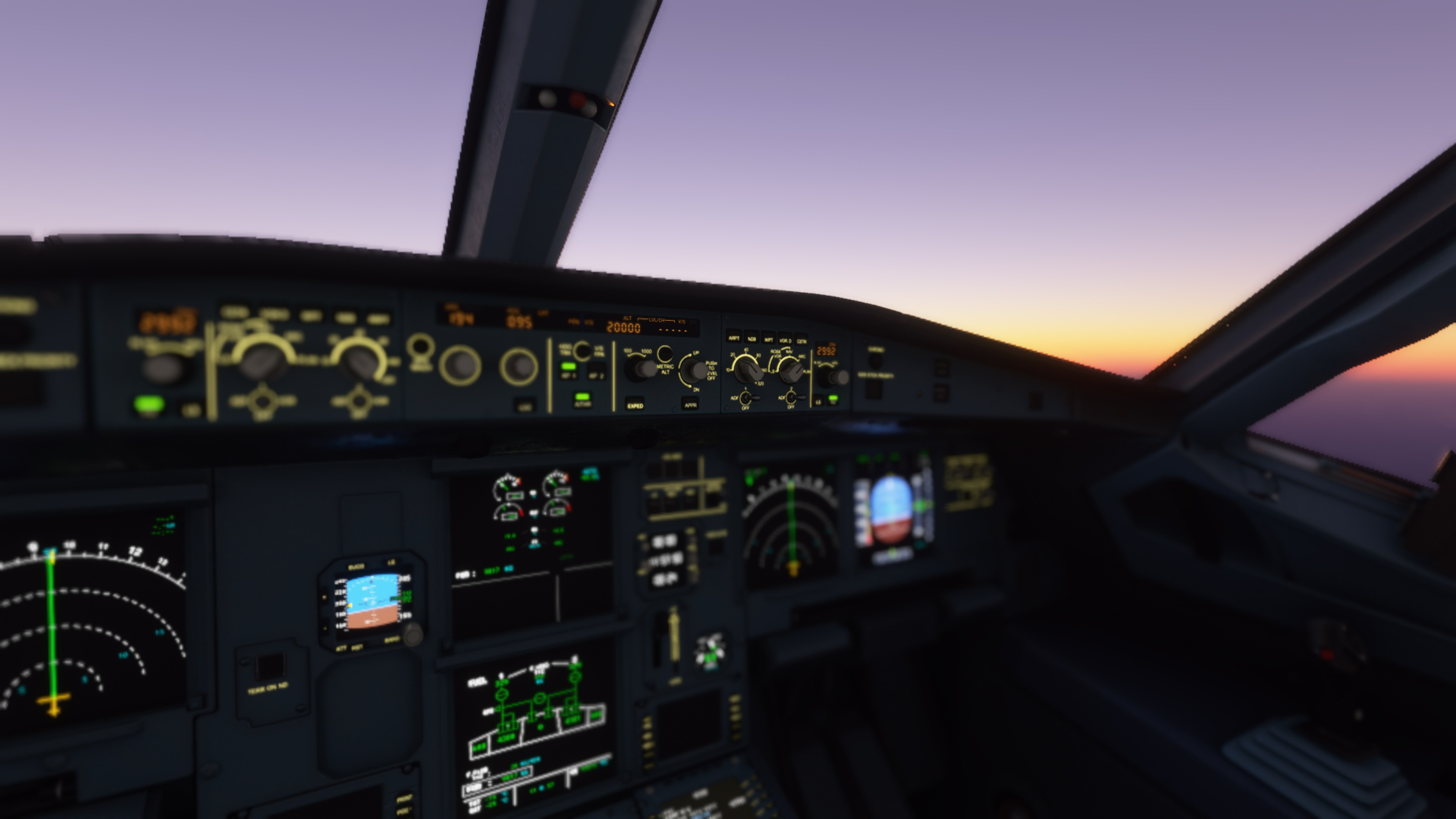 Against a sunset horizon, the warm glow of an aircraft control panel and its screens lights the cockpit.