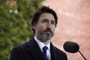 Justin Trudeau, Canada's prime minister, listens during a news conference outside Rideau Cottage in Ottawa, Ontario, Canada, on Tuesday, Dec. 1, 2020.