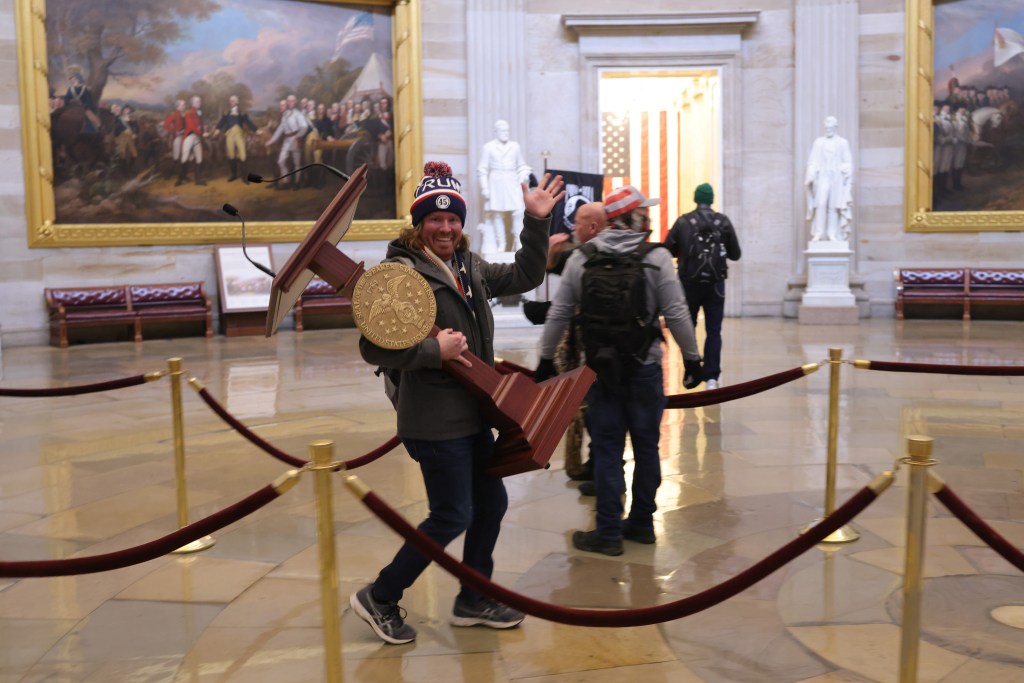 Protesters enter the U.S. Capitol Building on January 06, 2021 in Washington, DC. Congress held a joint session today to ratify President-elect Joe Biden's 306-232 Electoral College win over President Donald Trump. A group of Republican senators said they