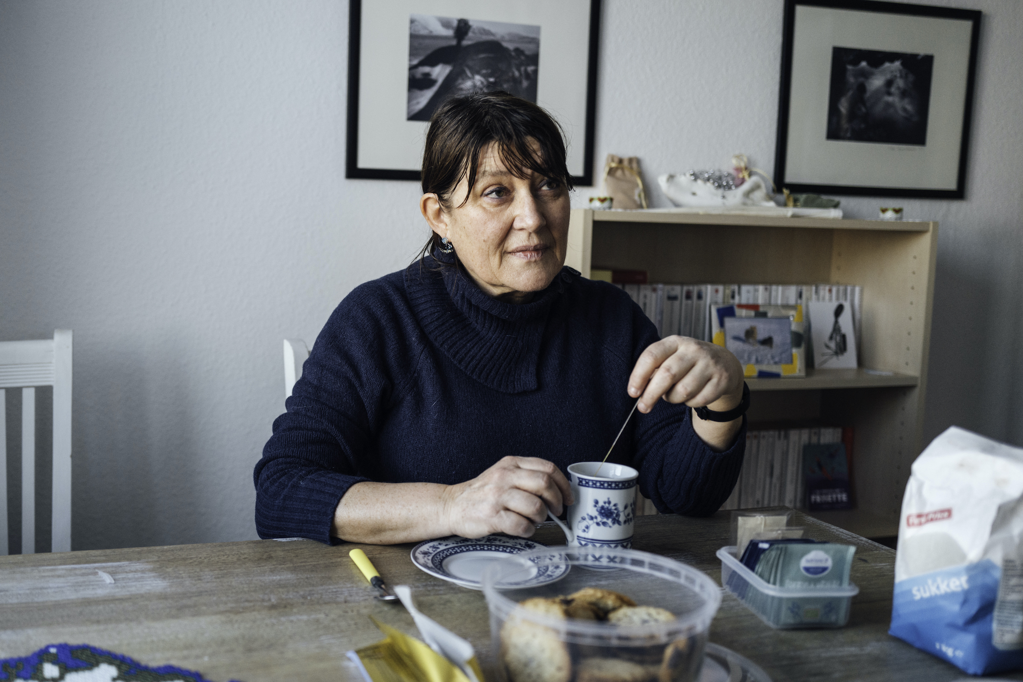 Dr. Annie Kerouedan sits at her kitchen table in Uummannaq, a day after leaving her position at the hospital.