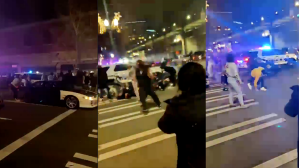 ​A police officer is seen on bystander video accelerating through an intersection full of people in Tacoma, Washington, on January, 23, 2021. (Screenshots of bystander video)