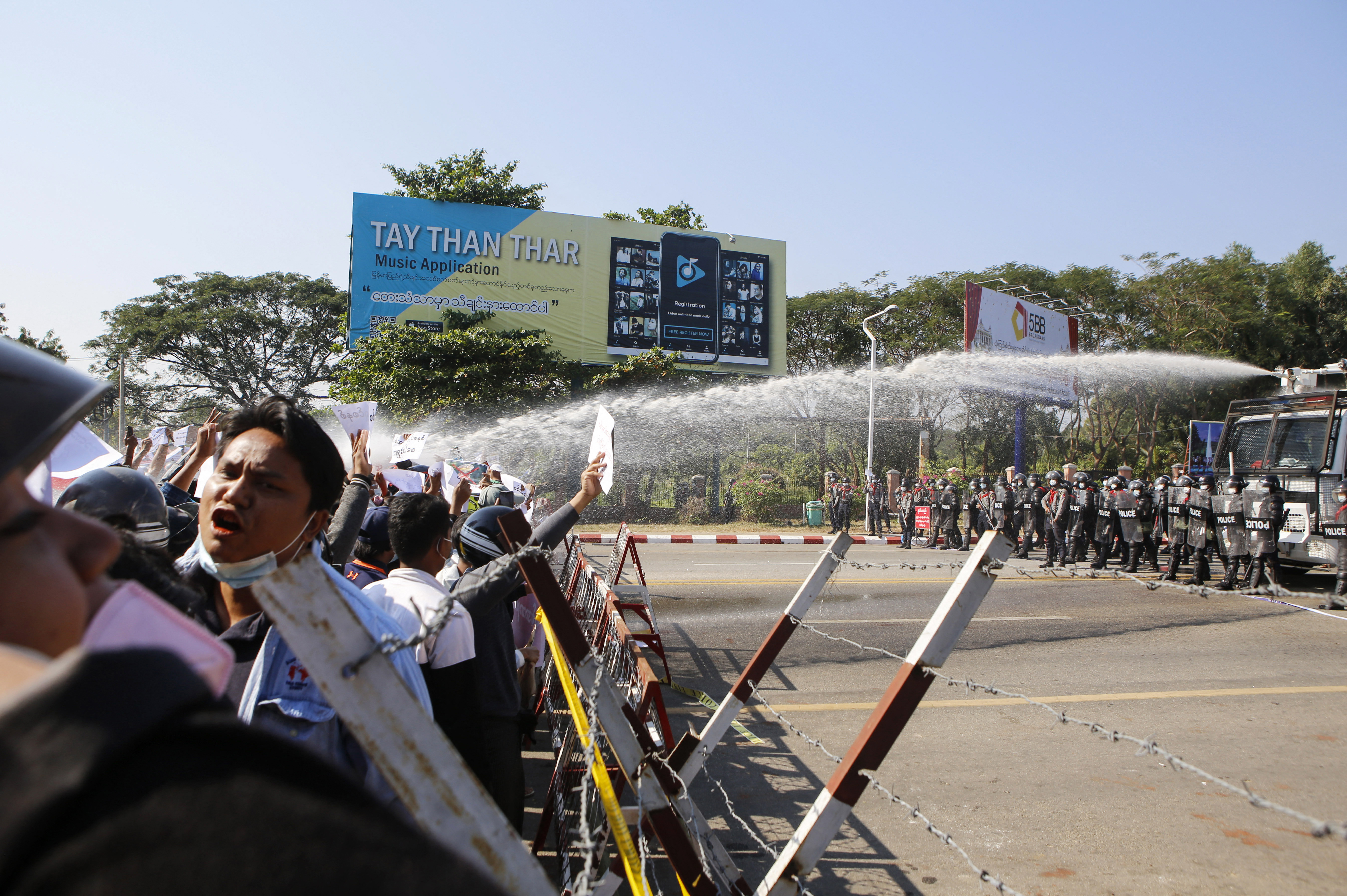 A water cannon is fired at protesters in Naypyitaw on Feb. 9, 2021. PHOTO: AFP