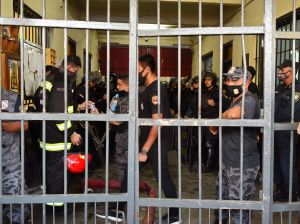Riot police are seen at the Tacumbu jail after a riot in Asuncion on February 16, 2021.