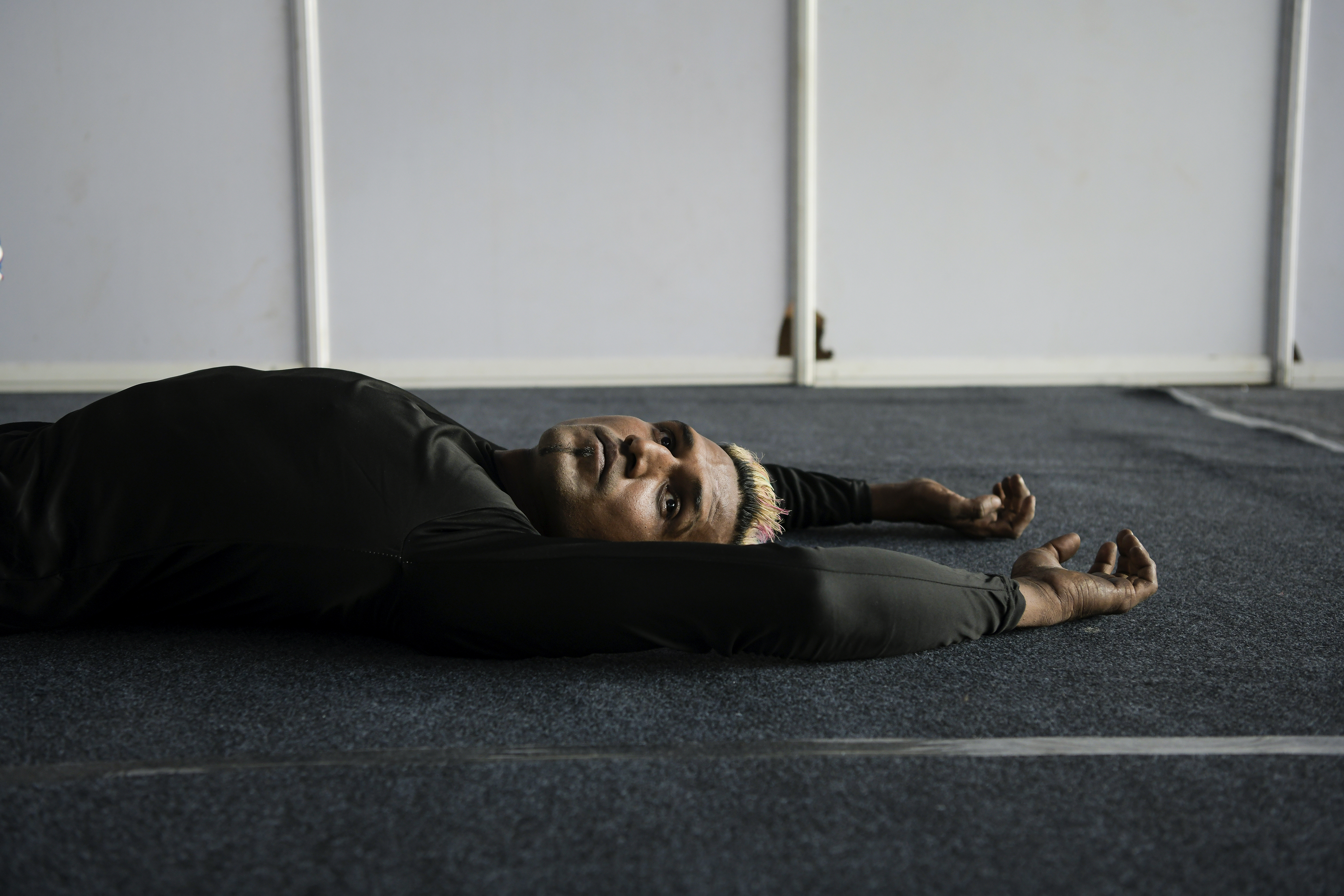 Halder lies down after a training session.