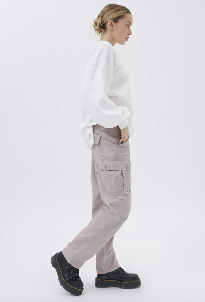 Woman in gray cargo pants