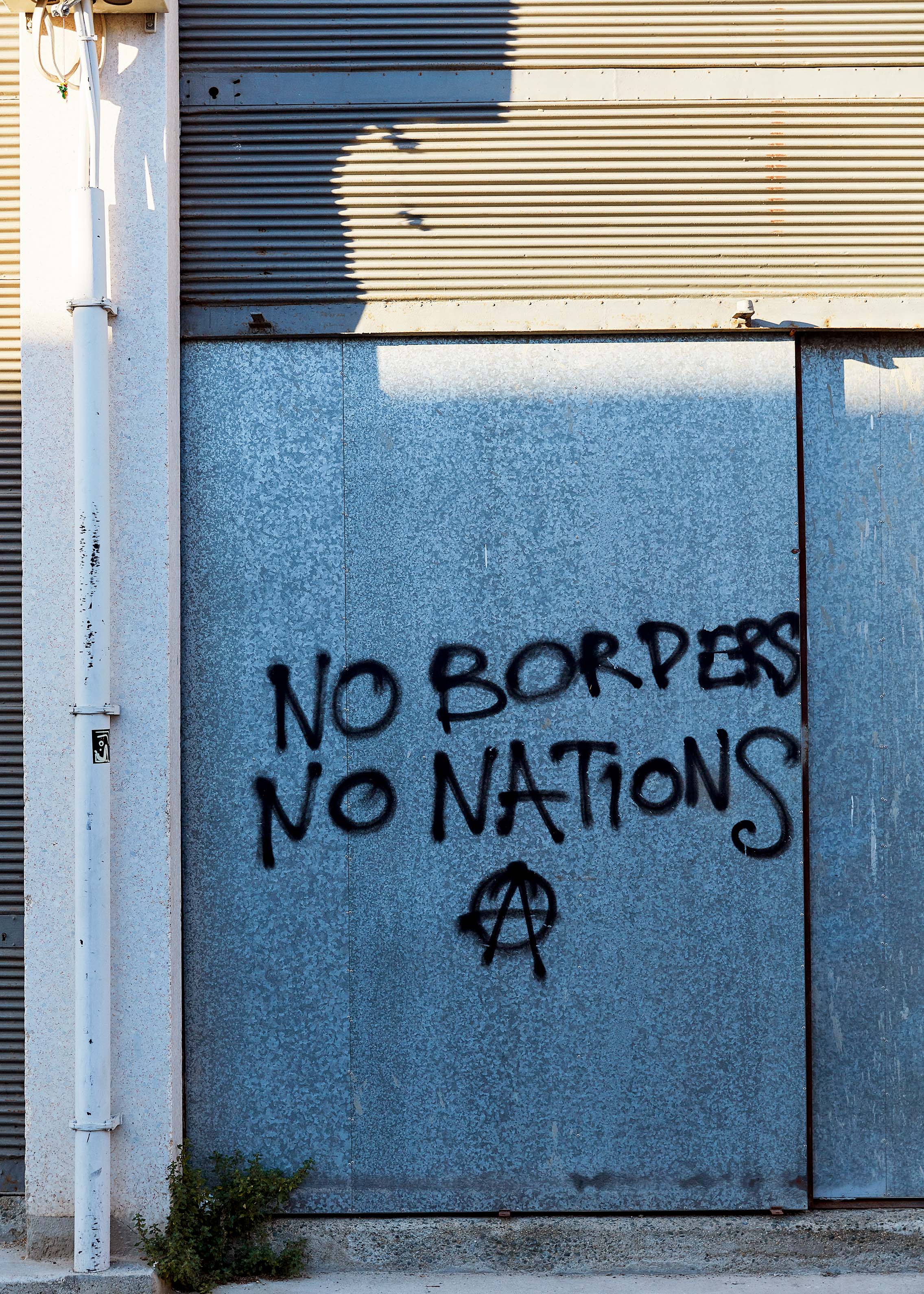 A graffiti sign reading