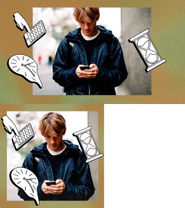 young man looking down at cell phone