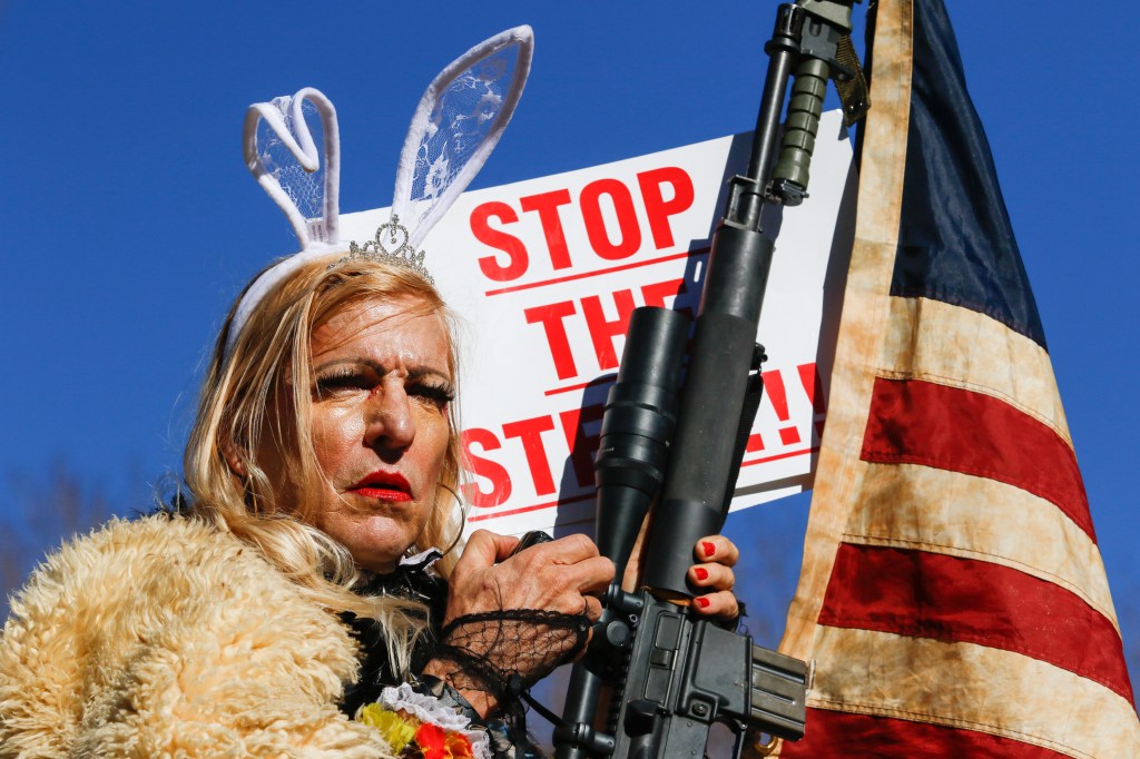 CARSON CITY, NEVADA, UNITED STATES - 2021/01/16: A protester by the name of Cowboy Barbie, with an AR-15 rifle. Trump supporters gather at the state capital to protest before Biden's inauguration. Crowd size remained small (Ty O'Neil/SOPA Images/LightRock