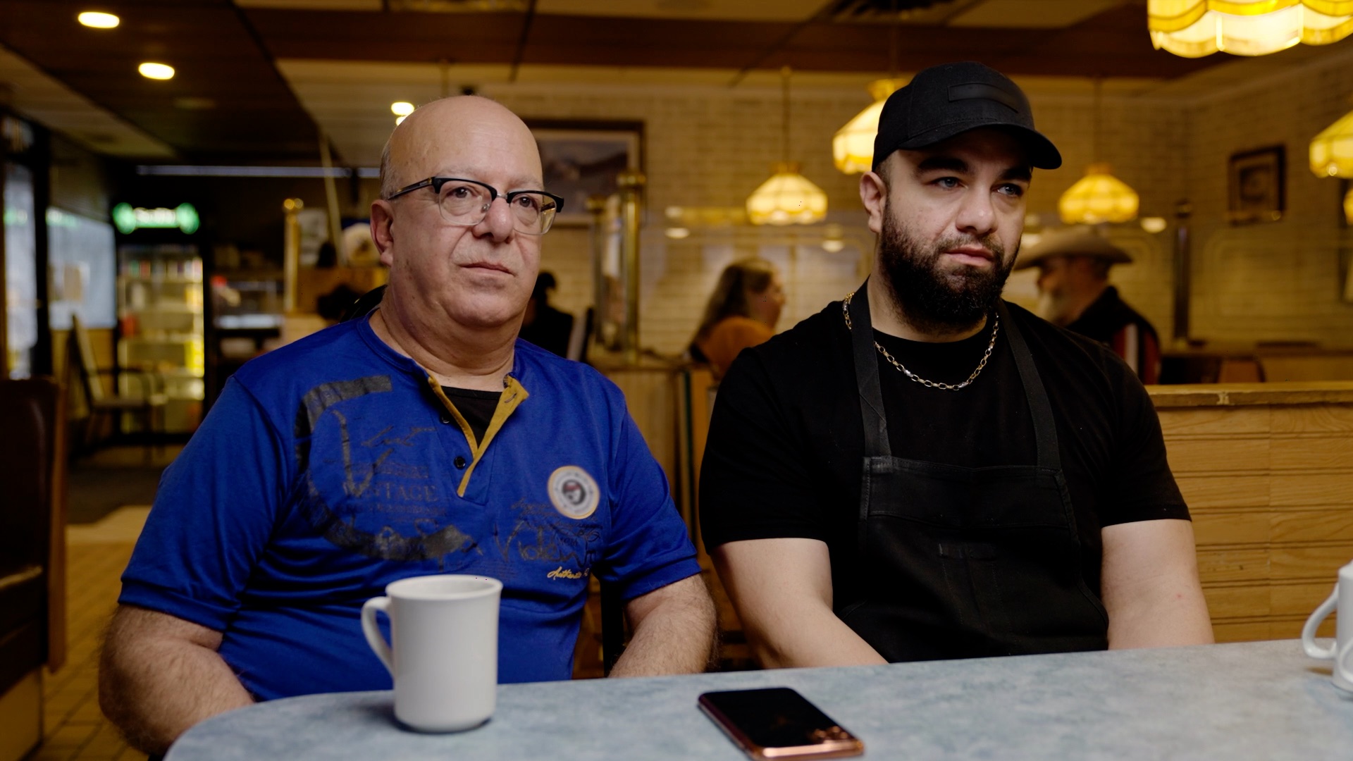 Nazem Kamaleddine, who became a baron at 18, and his son Kamal.