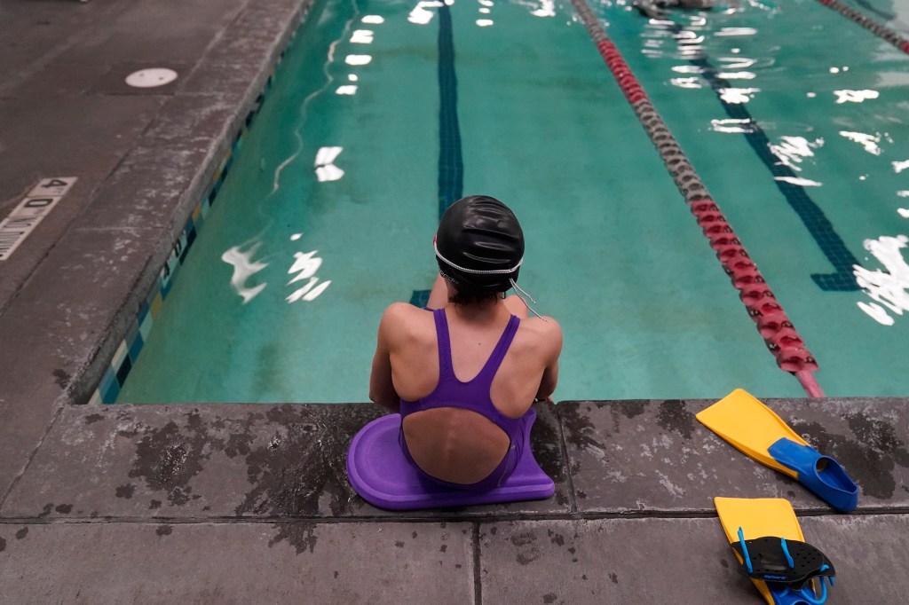 A proposed ban on transgender athletes playing sports would affect transgender girls like this 12-year-old swimmer.​