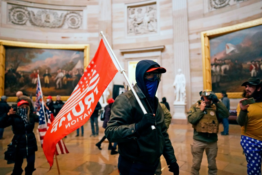Protesters gather storm the Capitol and halt a joint session of the 117th Congress on Wednesday, Jan. 6, 2021 in Washington, DC.