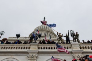 Demonstrators attempt to enter the U.S. Capitol building on Wednesday, Jan. 6, 2021. (Eric Lee/Bloomberg via Getty Images)​