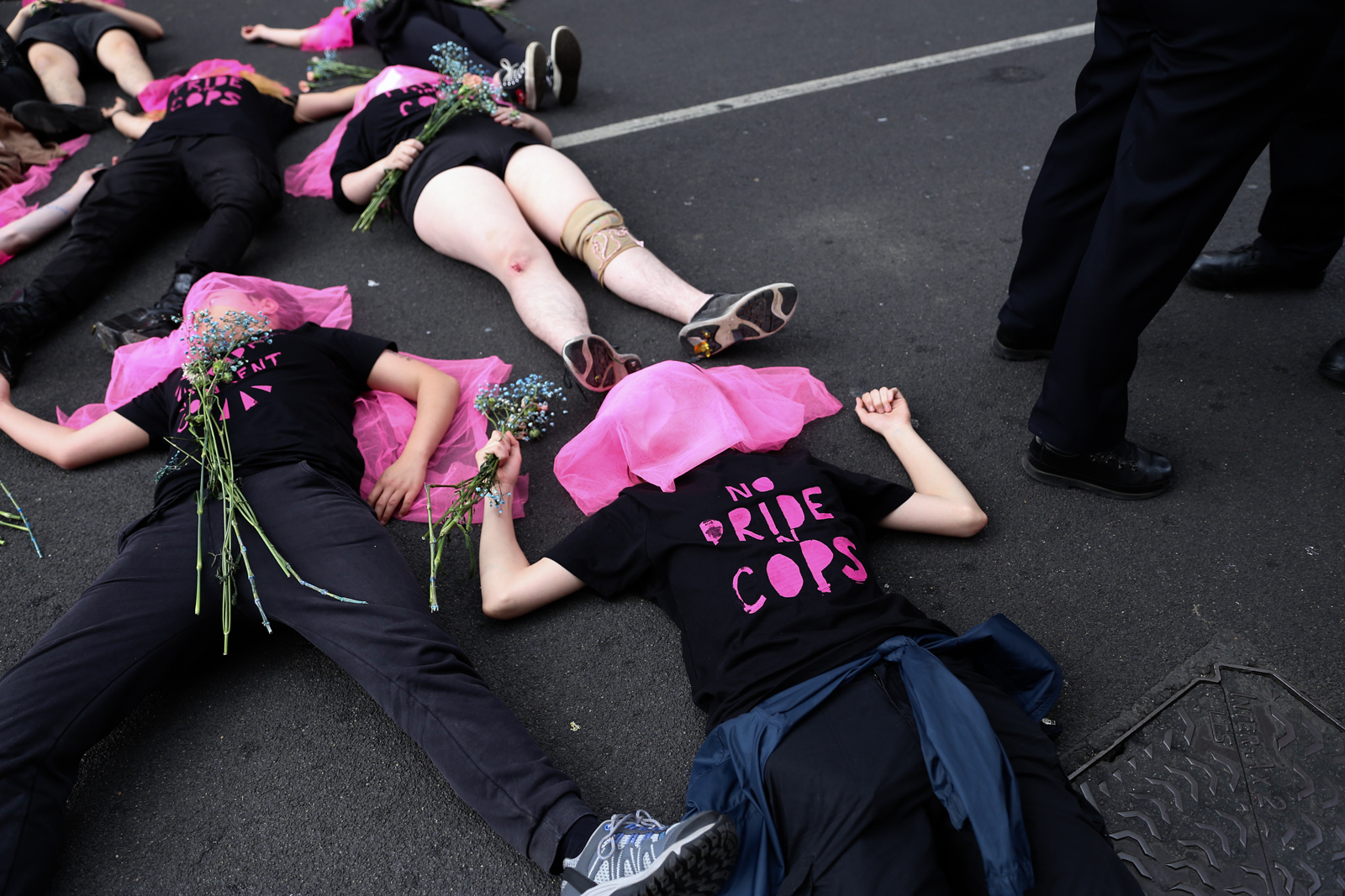 Lesbians and Gays Support the Migrants activists during die-in at London Pride 2022
