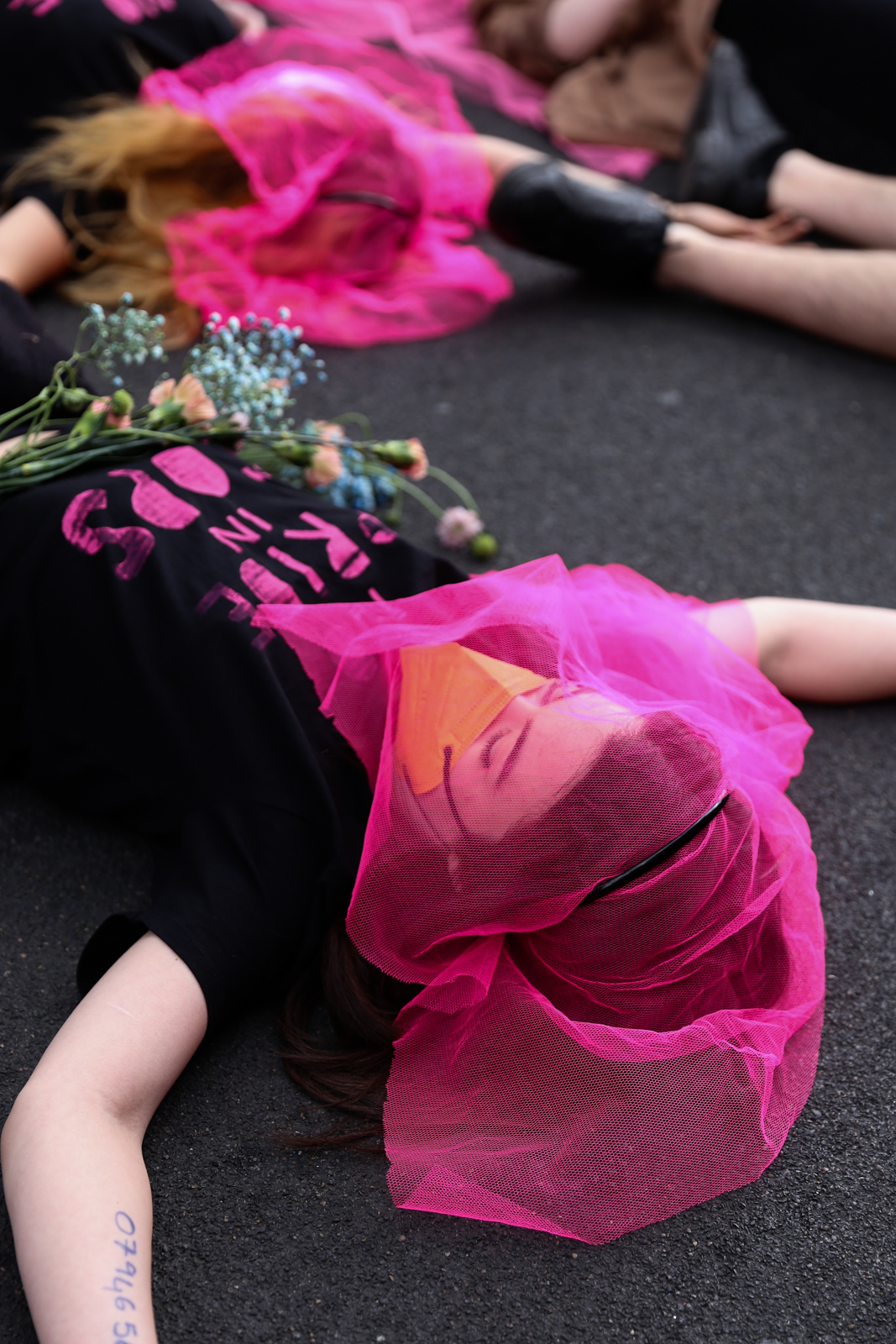 London Pride 2022: Lesbian and Gays Support the Migrants activists in pink veil