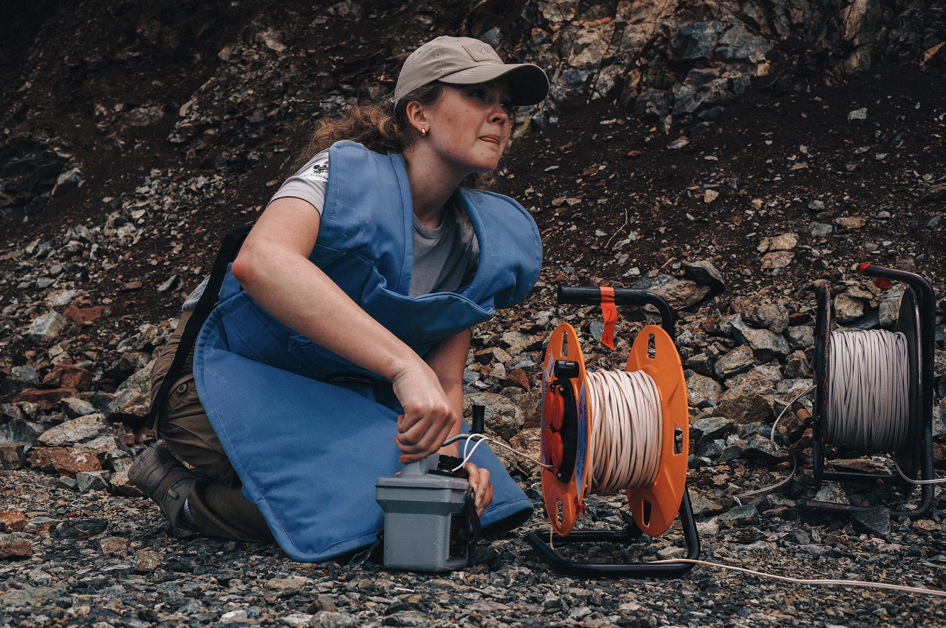 Anastasiia Minchukova presses the red detonator button and listens for the sound of an explosion in the distance.