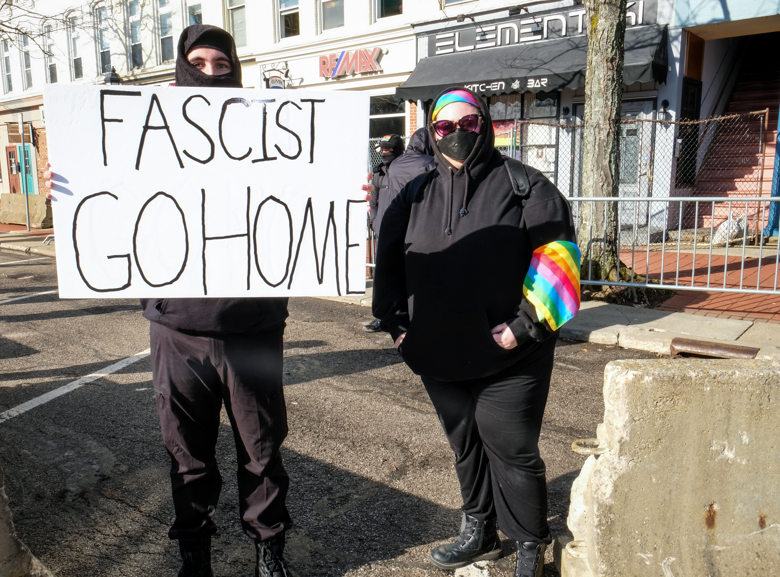 A small group of counterprotesters, including antifascists in all black, also convened outside Element 41.