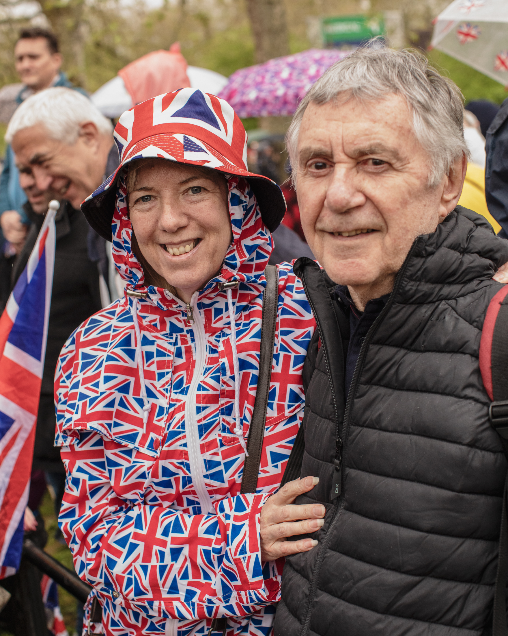 Coronation of King Charles II, London: A couple in raincoats