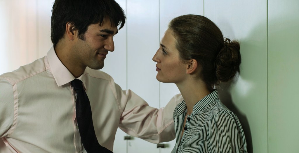 The Do’s and Don’ts of Workplace Flirting Without Getting Fired, According to an Expert